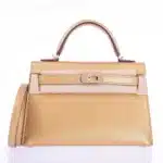 Hermès Rare Collectible Mini Kelly 20 Sellier Olympic Gold Metallic Doré Chevre Chamkilight Gold Hardware Lushentic Replica