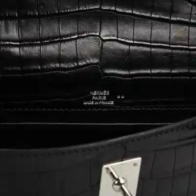 Hermès Kelly Pochette Black Matte Niloticus Crocodile logo1