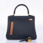 Hermès Rare Collectible Kelly 25 Retourne Bleu Nuit Swift Colormatic Gold Hardware Lushentic Bags