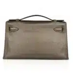 Hermès Rare Collectible Kelly Pochette Metallic Bronze Chevre Palladium Hardware luxury bags