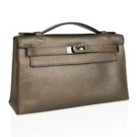 Hermès Rare Collectible Kelly Pochette Metallic Bronze Chevre Palladium Hardware luxury bags